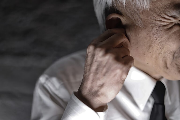 Middle aged man suffering from earache