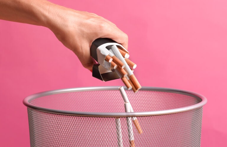 Woman giving up smoking through illness