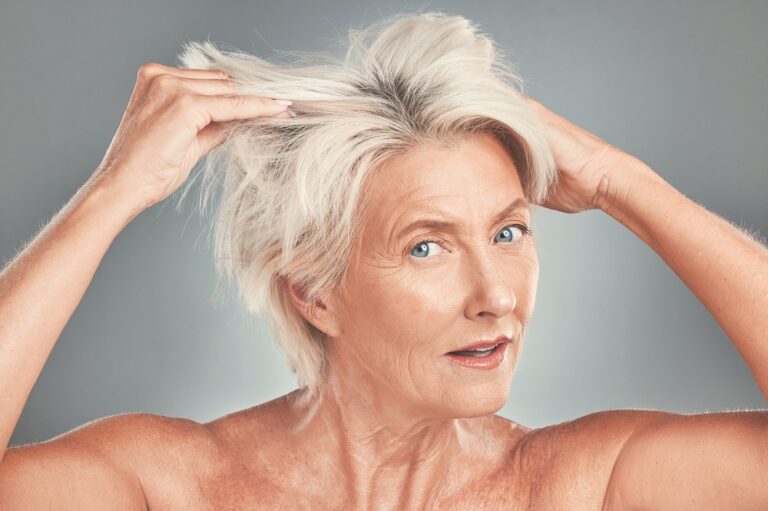 Messy hair, woman and senior model looking for hair care, wellness and salon hairstyle cut. Portrait of an elderly person from Amsterdam with bed head look ready for skin wellness and dye treatment