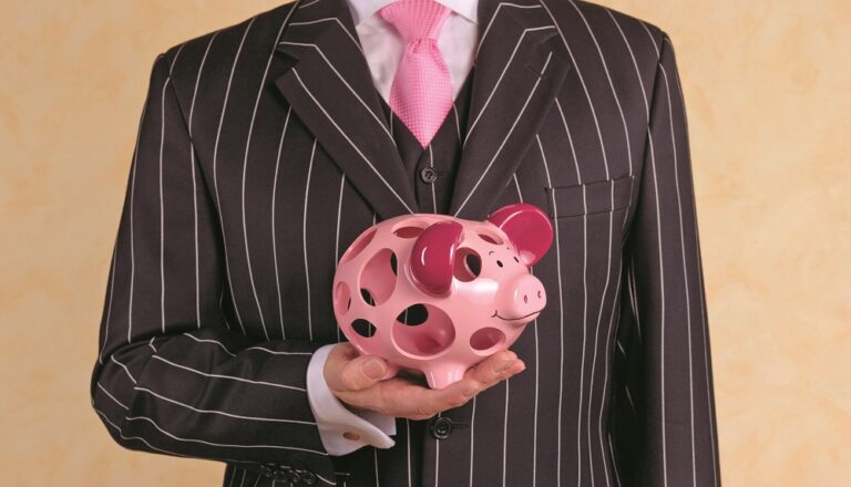 Banker/financial advisor with holey piggy bank