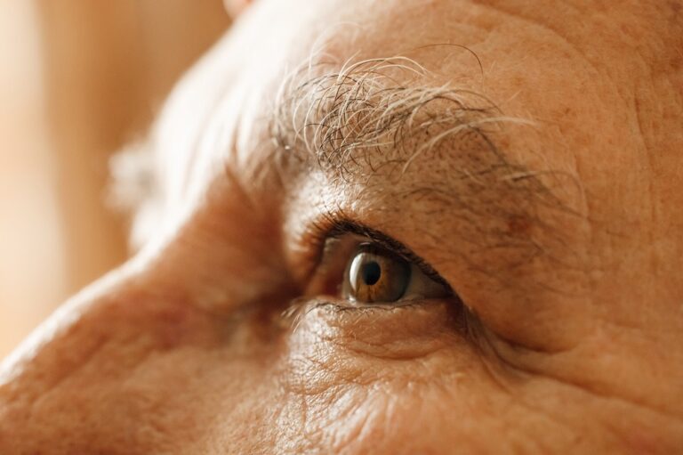 Close-up image of senior lady eye with barely noticeable effects of age-related eye conditions