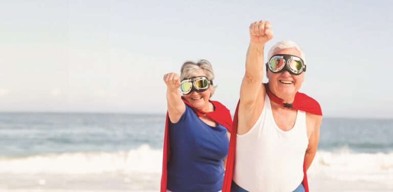 Senior couple wearing superman costume