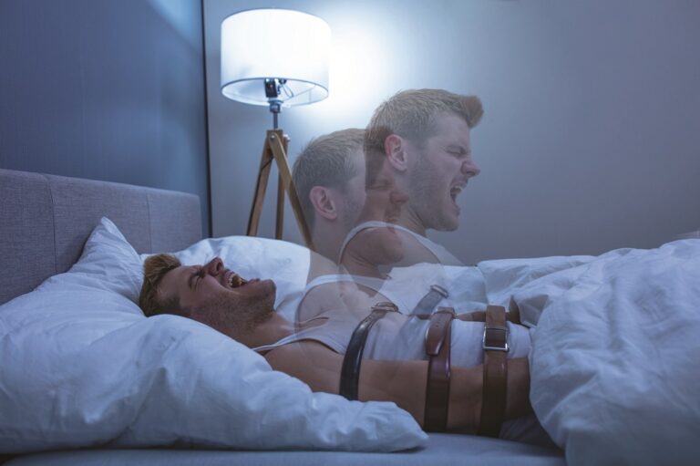 Man Suffering From Sleep Paralysis
