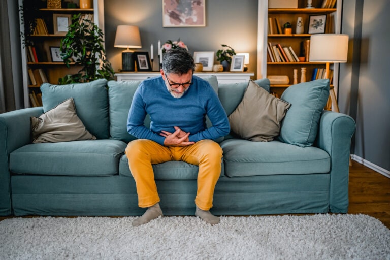 Man suffering from stomach pain