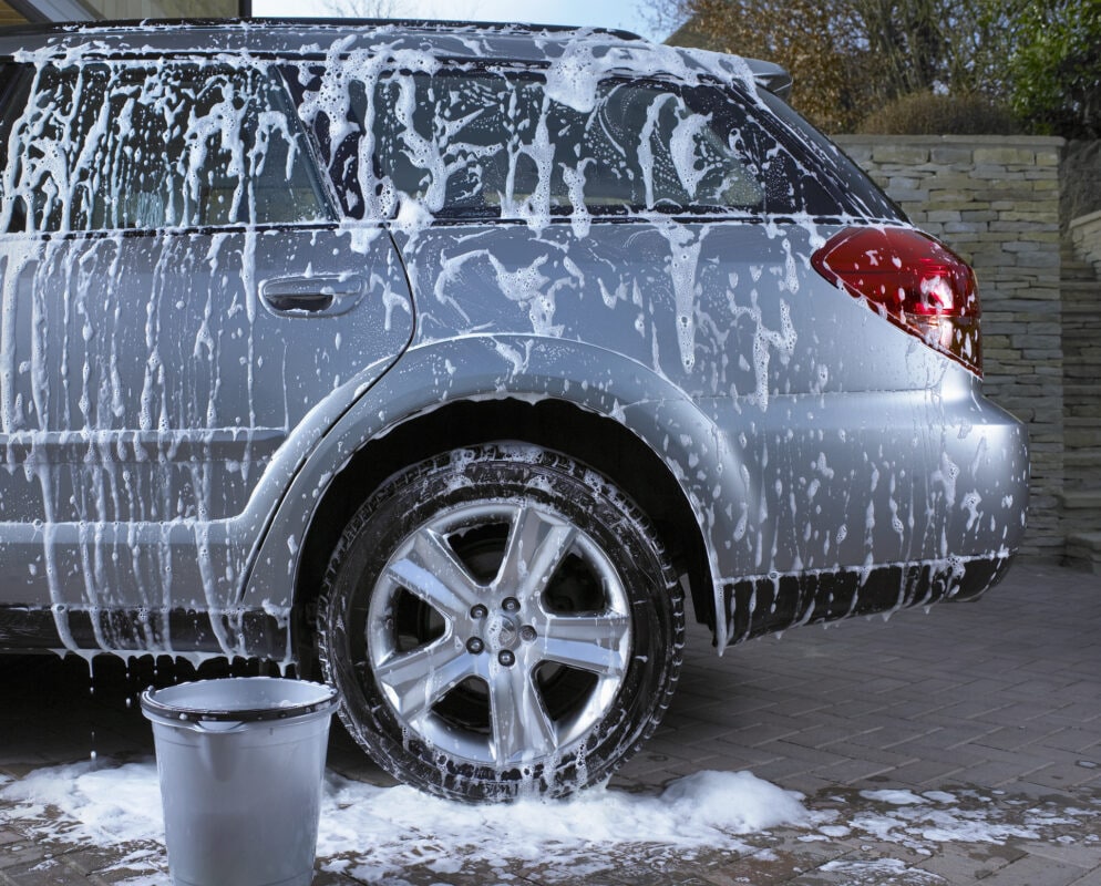 Soap suds and water on car