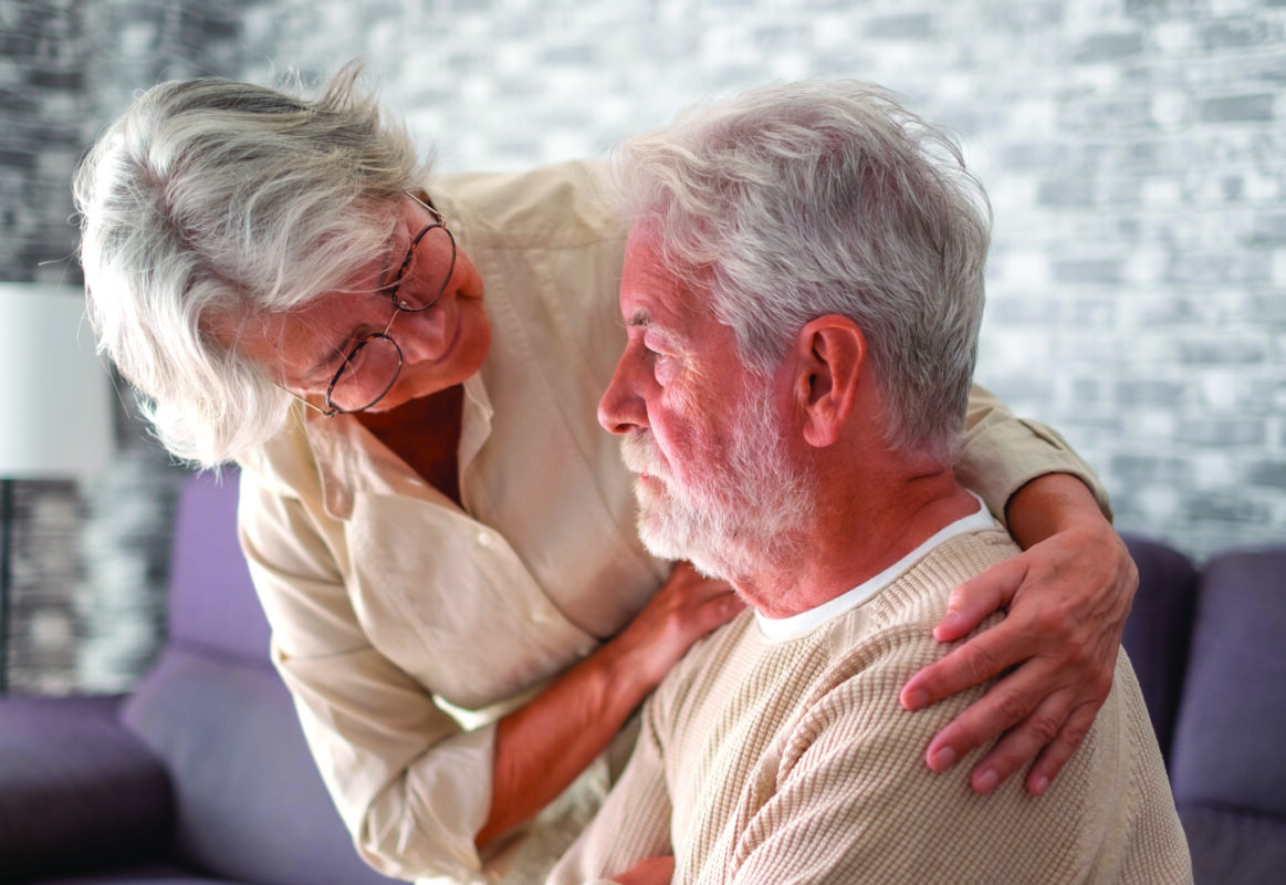 Old worried senior woman comforting her depressed, mental ill husband, unhappy elderly man at home need medical help. Ourmindsmatter
