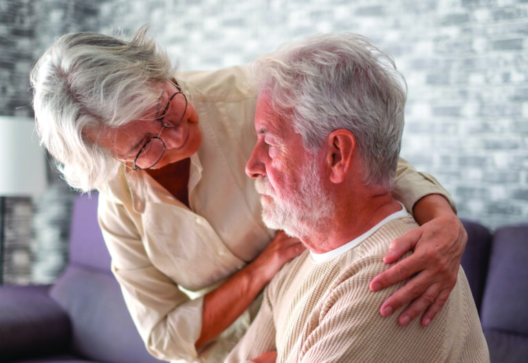 Old worried senior woman comforting her depressed, mental ill husband, unhappy elderly man at home need medical help. Ourmindsmatter