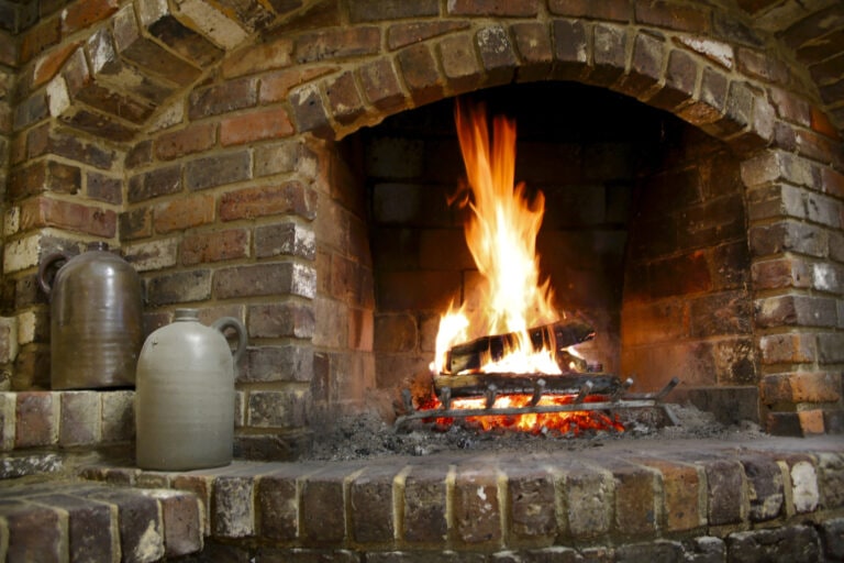 Wood Burning In  Stone Fireplace