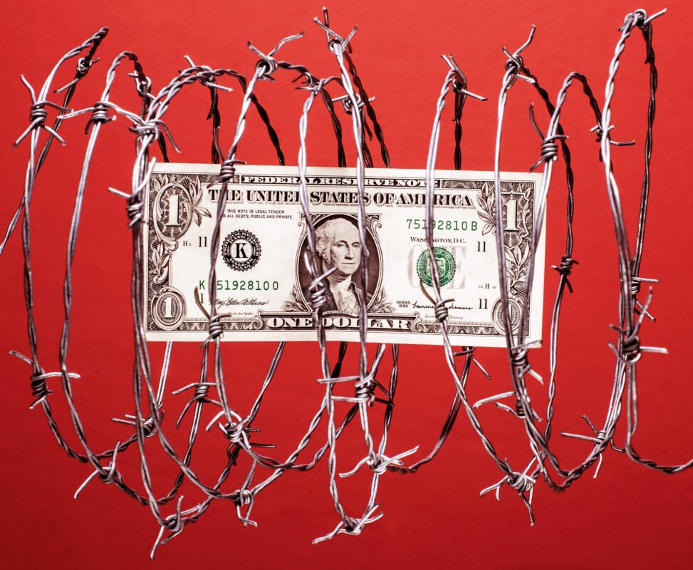 Money protection - Dollar in barbed wire