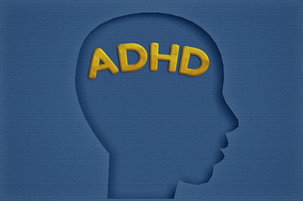paper  head with ADHA text