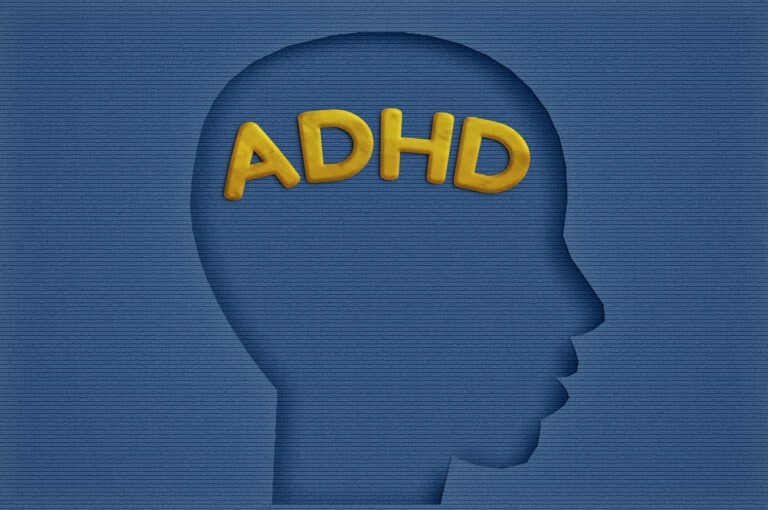paper  head with ADHA text