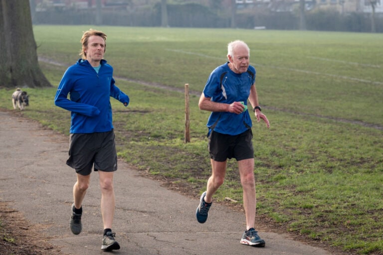Runners In Public Park