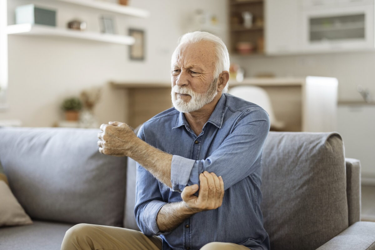 Senior man with Elbow Pain