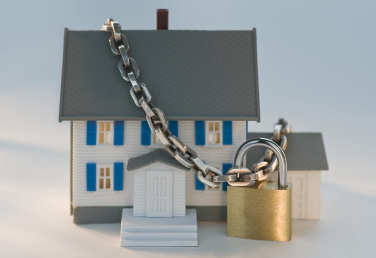 Model house locked with chain