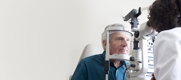 Optometrist with patient