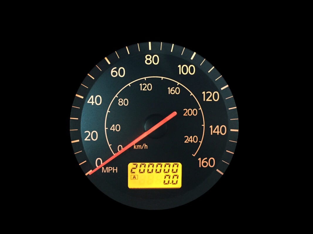High Mileage Odometer Isolated on Black