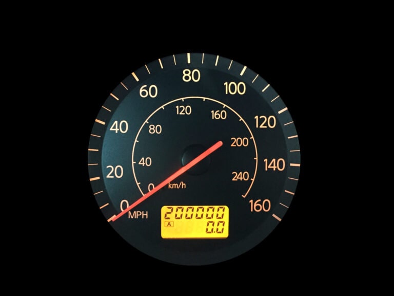 High Mileage Odometer Isolated on Black
